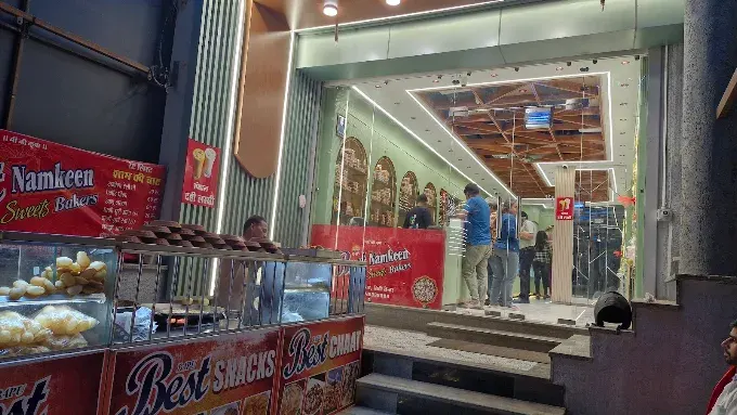 Gole Ka Mandir store — Fresh chaat up front, full namkeen wall inside.